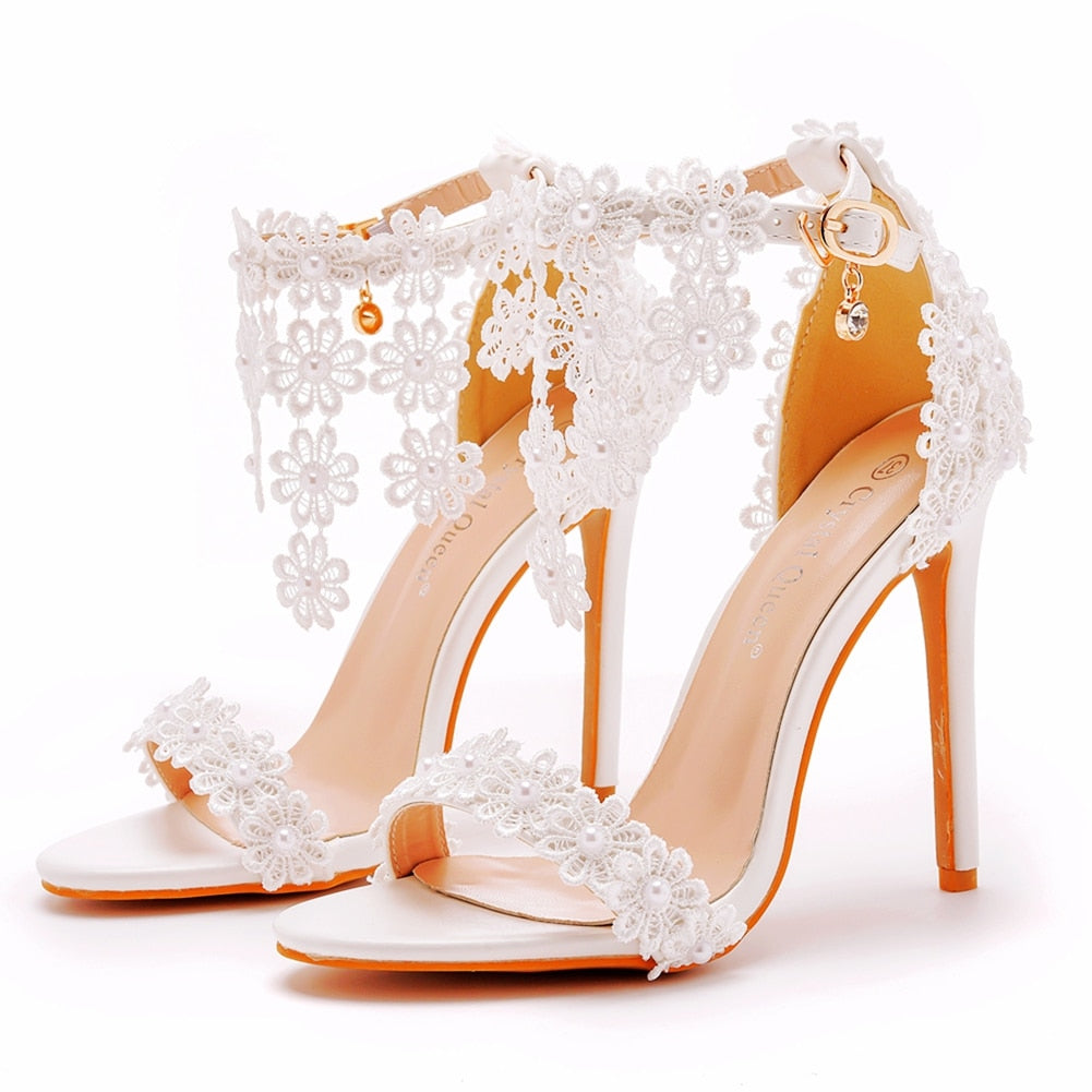 Crystal Queen Women Ankle Strap Sandals White Lace Flowers Pearl Tassel  Super Stiletto High Heels Slender Bridal Wedding Shoes